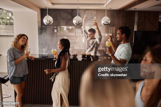 dancing on a party at home! - cocktail counter stock pictures, royalty-free photos & images