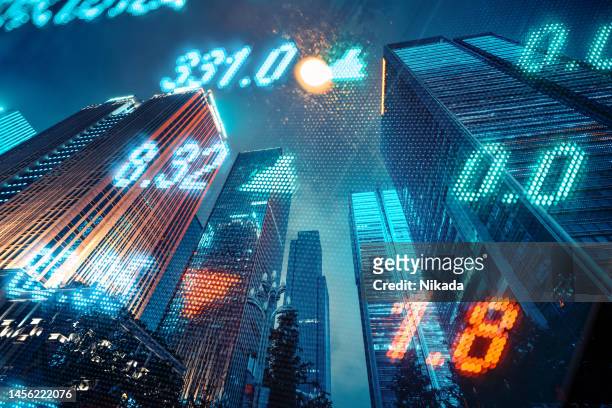 stockmarket and investment theme background with city skyscraper - stock price stock pictures, royalty-free photos & images