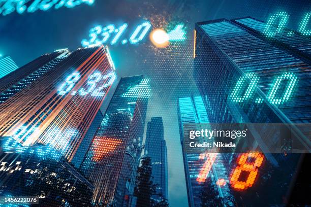 stockmarket and investment theme background with city skyscraper - mercado imagens e fotografias de stock