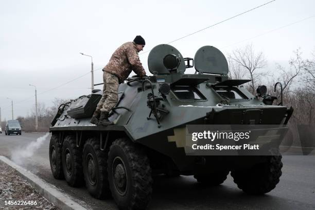 Military vehicle is unloaded on the road to Bakhmut on January 13, 2023 in Druzhkivka, Ukraine. Russia has stepped up its offensive in the Donetsk...