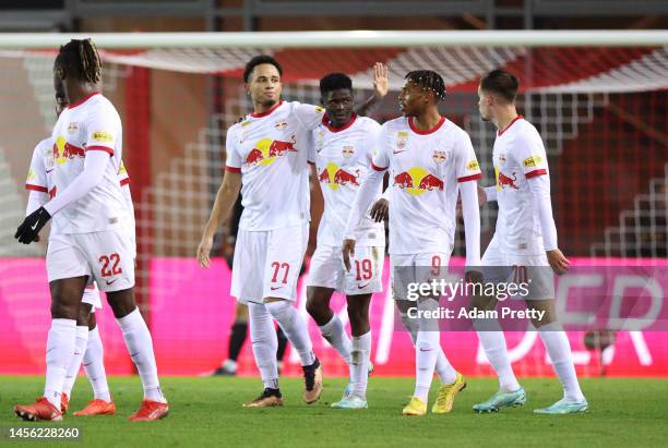 Noah Okafor of Salzburg celebrates scoring his team's third goal with Karim Konaté, Chukwubuike Adamu and Sekou Koita during a test match between FC...