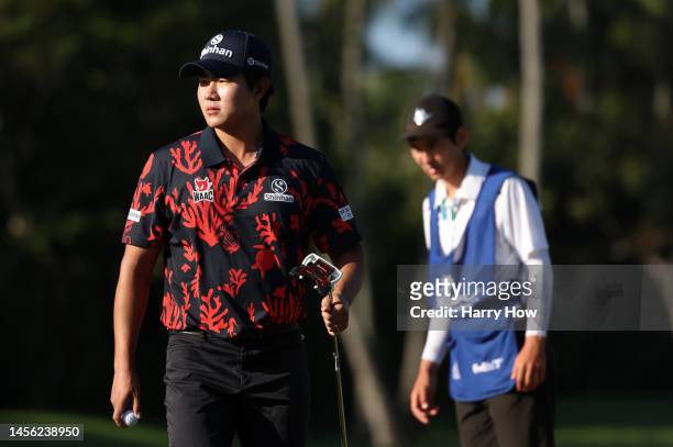 Kim of South Korea reacts to his birdie putt on the tenth green during the second round of the Sony Open in Hawaii at Waialae Country Club on January...