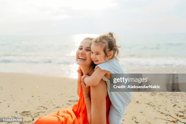 being playful at the beach - beach babes stock pictures, royalty-free photos & images