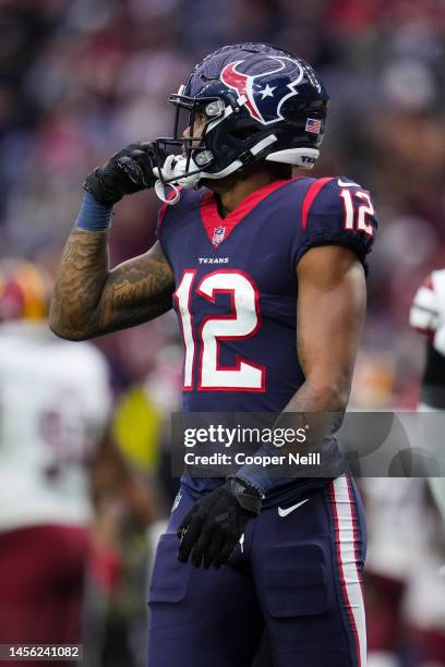 Nico Collins of the Houston Texans gets set against the Washington Commanders at NRG Stadium on November 20, 2022 in Houston, Texas.