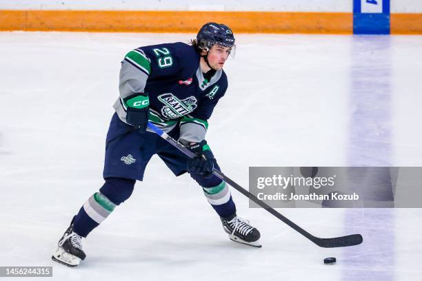 Jared Davidson of the Seattle Thunderbirds plays the puck during third period action against the Winnipeg ICE at Wayne Fleming Arena on January 11,...