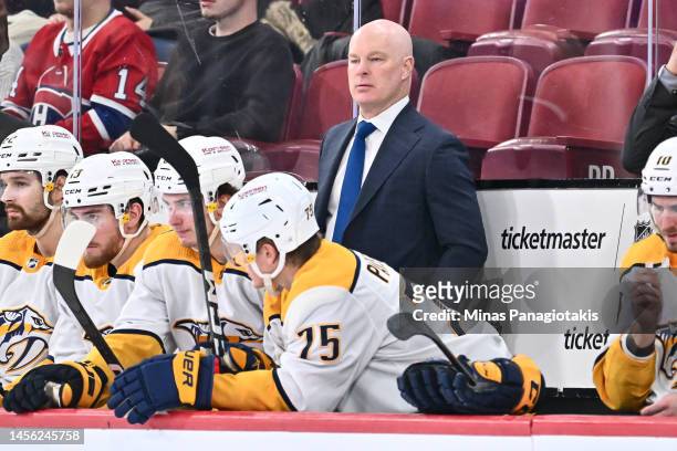 Head coach of the Nashville Predators John Hynes, handles bench duties during the third period against the Montreal Canadiens at Centre Bell on...