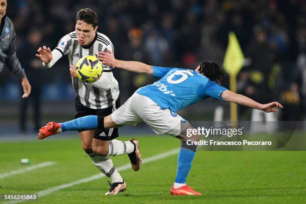 Federico Chiesa of Juventus battles for possession with Mario Rui of SSC Napoli during the Serie A match between SSC Napoli_Juventus at Stadio Diego...