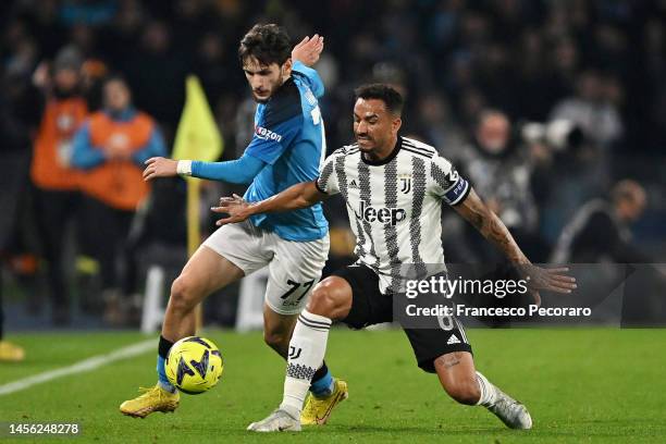 Khvicha Kvaratskhelia of SSC Napoli battles for possession with Danilo of Juventus during the Serie A match between SSC Napoli_Juventus at Stadio...