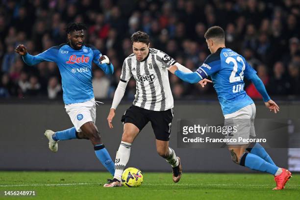 Federico Chiesa of Juventus battles for possession with Frank Anguissa and Giovanni Di Lorenzo of SSC Napoli during the Serie A match between SSC...