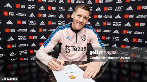Wout Weghorst of Manchester United poses after signing on loan for the club at Carrington Training Ground on January 13, 2023 in Manchester, England.