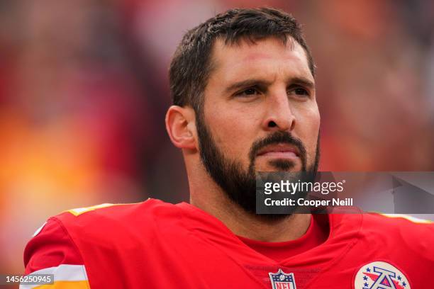 James Winchester of the Kansas City Chiefs stands during the national anthem against the Los Angeles Rams at GEHA Field at Arrowhead Stadium on...