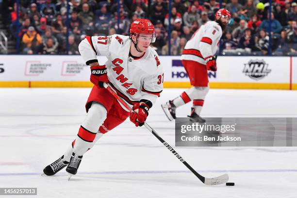 Andrei Svechnikov of the Carolina Hurricanes skates with the puck during the second period of a game against the Columbus Blue Jackets at Nationwide...