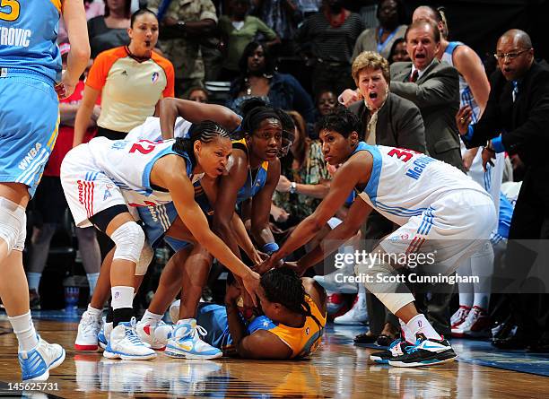 Epiphanny Prince of the Chicago Sky holds on to a loose ball against Armintie Price of the Atlanta Dream at Philips Arena on June 2, 2012 in Atlanta,...