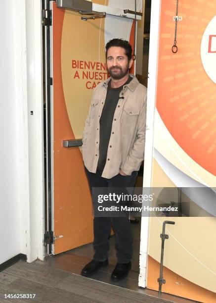 In this image released on January 13, Gerard Butler visits "Despierta America" to promote his new movie "Plane" at Univision Studios on January 12,...