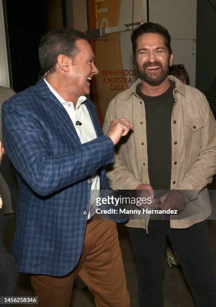 In this image released on January 13, Alan Tacher and Gerard Butler promotes new movie Plane at Despierta America morning show at Univision Studios...