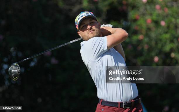 Austin Cook of the United States plays his shot from the ninth tee during the second round of the Sony Open in Hawaii at Waialae Country Club on...