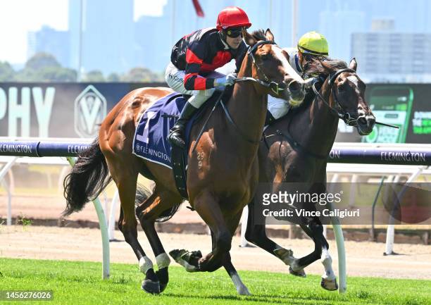 Harry Coffey riding Dunkel winning Race 2, the The Stud And Stable Staff Awards, during Melbourne Racing at Flemington Racecourse on January 14, 2023...