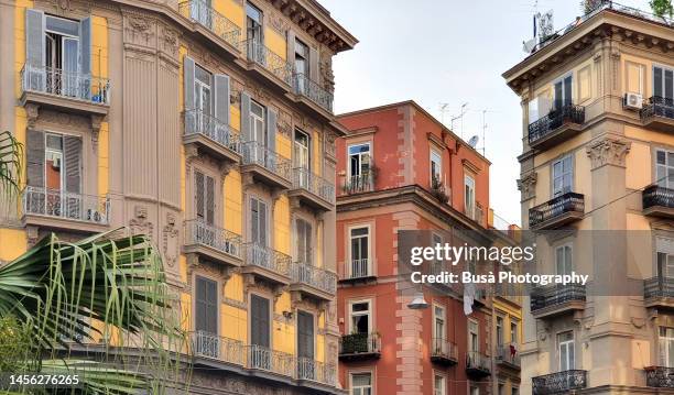 sunset on old residential buildings in naples, italy - napoli stock pictures, royalty-free photos & images