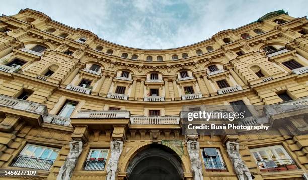 facades of imposing neo-renaissance residential buildings in boulevard corso umberto i in naples, italy - inquadratura estrema dal basso foto e immagini stock