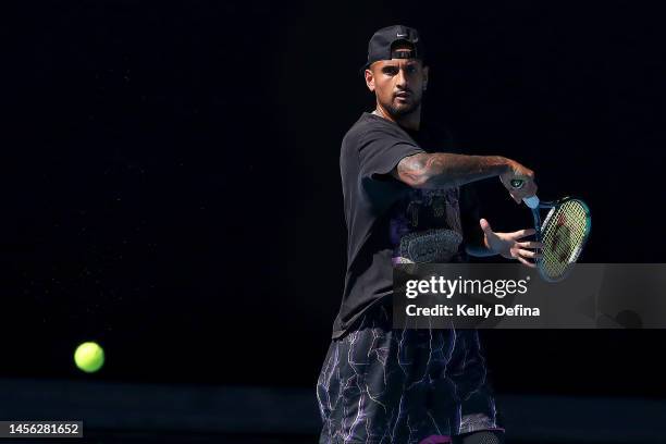 Nick Kyrgios of Australia plays a forehand during a practice session ahead of the 2023 Australian Open at Melbourne Park on January 13, 2023 in...