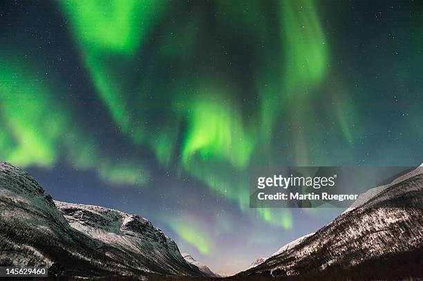 northern lights (aurora borealis) near tromsoe - tromsö stock-fotos und bilder