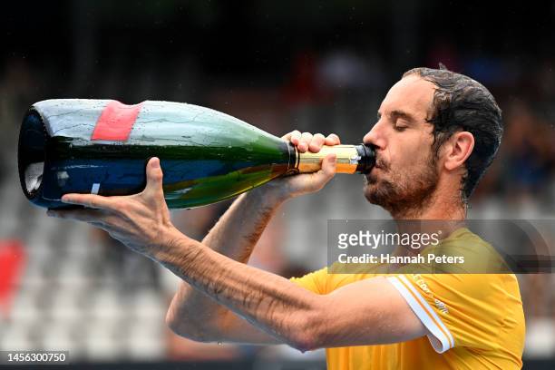 Richard Gasquet of France celebrates with champagne after winning the Men's singles final against Cameron Norrie of Great Britain during day six of...