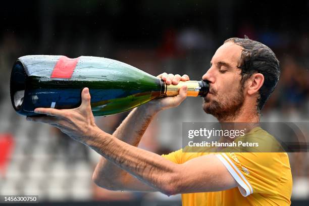 Richard Gasquet of France celebrates with champagne after winning the Men's singles final against Cameron Norrie of Great Britain during day six of...