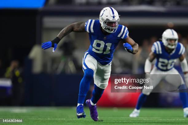Yannick Ngakoue of the Indianapolis Colts defends against the Dallas Cowboys at AT&T Stadium on December 4, 2022 in Arlington, Texas.
