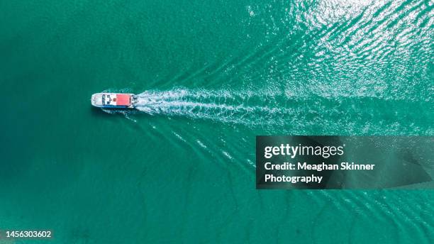 boating on turquoise blue water - brunswick heads nsw stock pictures, royalty-free photos & images