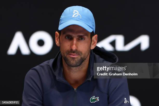 Novak Djokovic of Serbia talks to the media during a press conference ahead of the 2023 Australian Open at Melbourne Park on January 14, 2023 in...