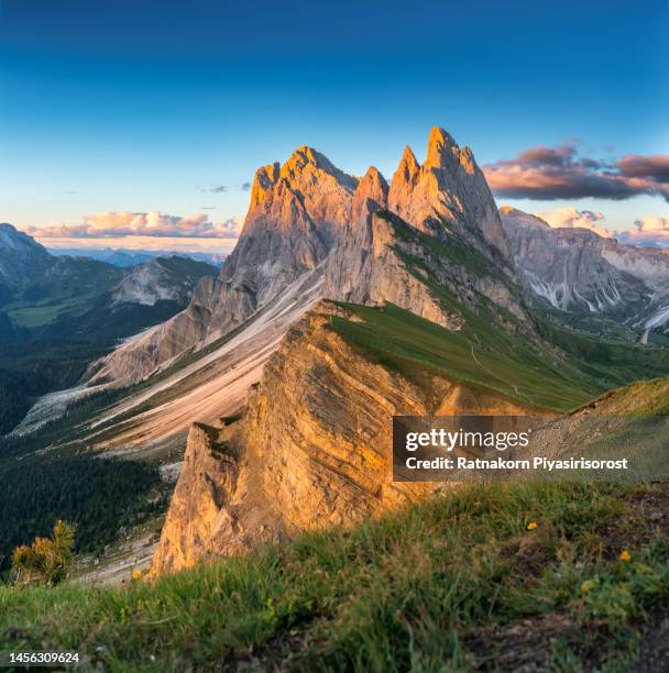 seceda peak. trentino alto adige, dolomites alps, south tyrol, italy. odle mountain range, val gardena. majestic furchetta peak. odles group seen from seceda, santa cristina val gardena. - mediterranean climate stock pictures, royalty-free photos & images