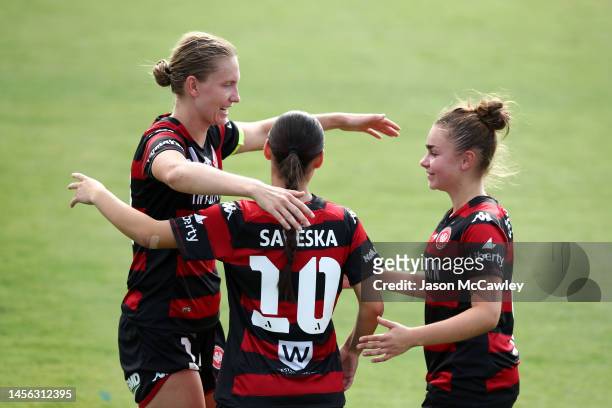 Clare Hunt and Sienna Saveska of the Wanderers celebrate victory during the round 10 A-League Women's match between Western Sydney Wanderers and...