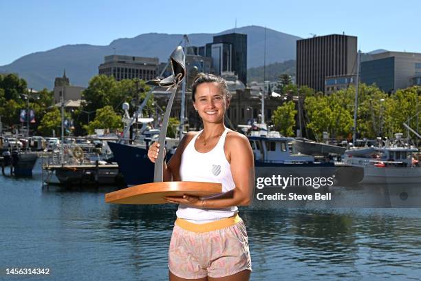 Lauren Davis of USA poses with the winners trophy on the Hobart waterfront during day six of the 2023 Hobart International at Domain Tennis Centre on...