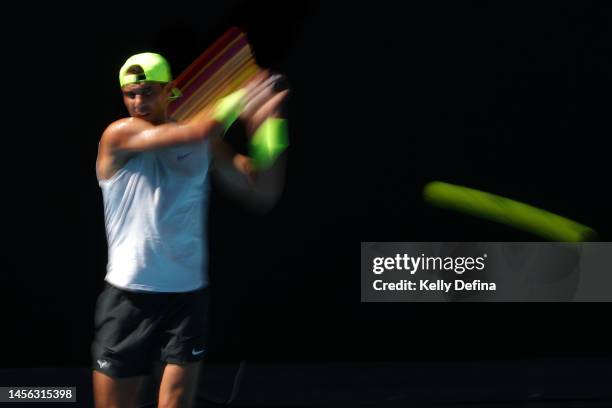 Rafael Nadal of Spain plays a backhand during a practice session ahead of the 2023 Australian Open at Melbourne Park on January 14, 2023 in...