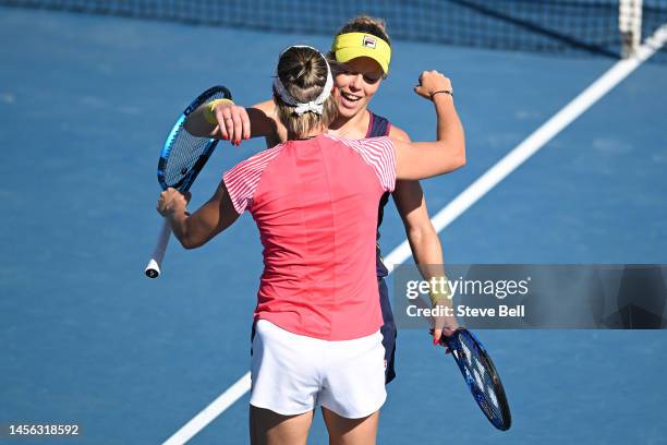 Laura Siegemund of Germany and Kirsten Flipkens of Belgium celebrate their win in the doubles final during day six of the 2023 Hobart International...