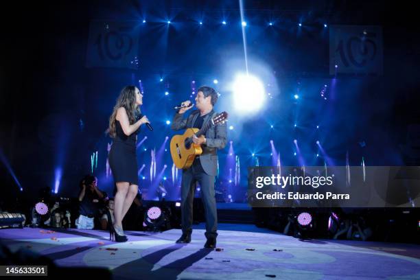 Alejandro Sanz and Malu performs during Cadena 100 Radio 20th anniversary concert at Vicente Calderon stadium on June 2, 2012 in Madrid, Spain.