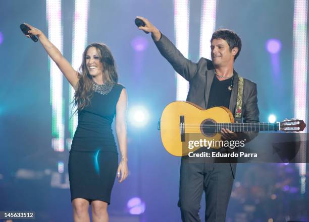 Alejandro Sanz and Malu performs during Cadena 100 Radio 20th anniversary concert at Vicente Calderon stadium on June 2, 2012 in Madrid, Spain.