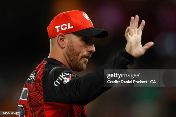 Aaron Finch of the Renegades waves to fans during the Men's Big Bash League match between the Melbourne Renegades and the Melbourne Stars at Marvel...