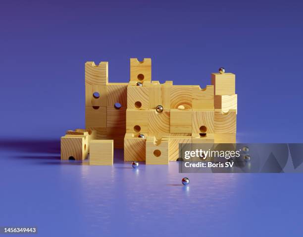 rolling ball structure made from wooden cubes - brockenbahn stock-fotos und bilder