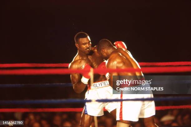 Main Event Match and Winners Circle Evander Holyfield And Dwight Muhammad Qawi on January 17, 1986 in Atlanta Georgia.