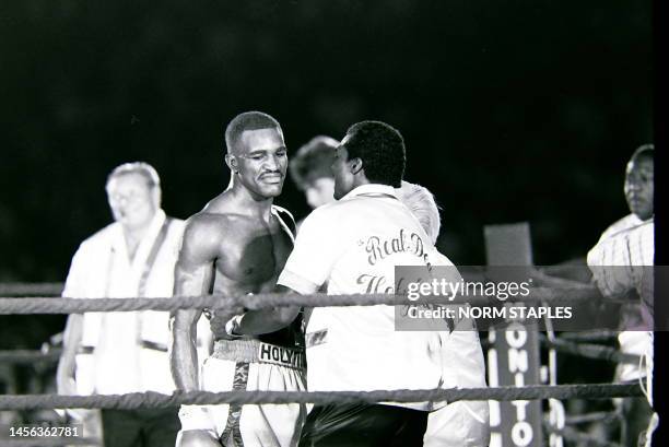 Main Event Match and Winners Circle Evander Holyfield And Dwight Muhammad Qawi on January 17, 1986 in Atlanta Georgia.