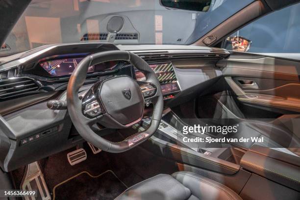 Peugeot 408 crossover electric car interior on display at Brussels Expo on January 13, 2023 in Brussels, Belgium.