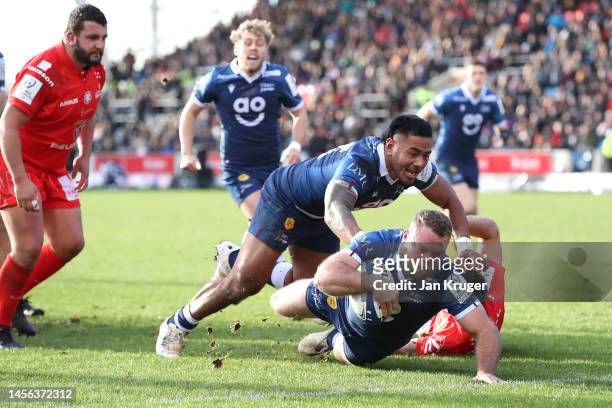 Akker van der Merwe of Sale Sharks scores his sides first try during the Heineken Champions Cup Pool B match between Sale Sharks and Stade Toulousain...