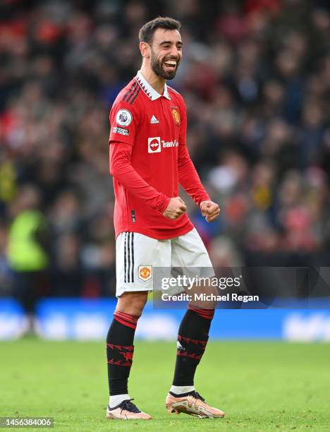 Bruno Fernandes of Manchester United celebrates after his side's victory in the Premier League match between Manchester United and Manchester City at...