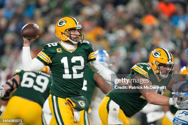 Aaron Rodgers of the Green Bay Packers throws a pass against the Detroit Lions in the second half at Lambeau Field on January 08, 2023 in Green Bay,...