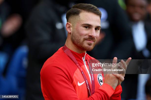 Alexis Mac Allister of Brighton & Hove Albion applauds the fans during a presentation for winning the FIFA World Cup with Argentina prior to the...