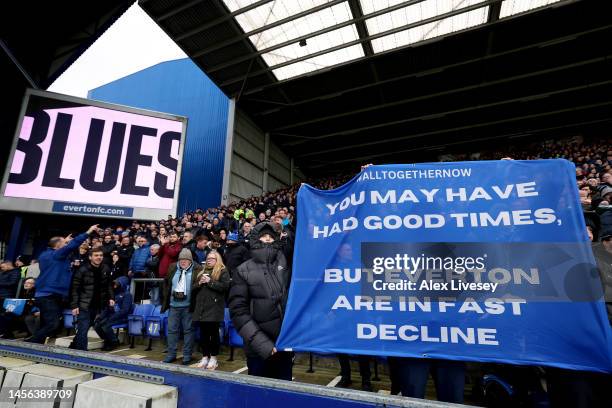 Fans of Everton hold up banners in protest against the clubs board during the Premier League match between Everton FC and Southampton FC at Goodison...