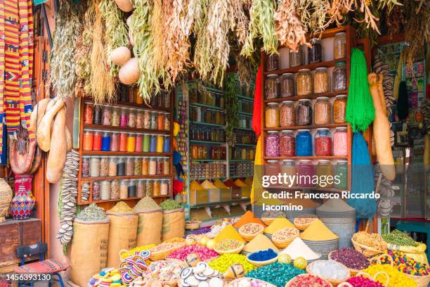 colorful spices and herbs on display in the souk - marrakech stockfoto's en -beelden