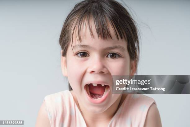 portrait of young excited shocked crazy smiling girl child kid  isolated on white color background - open day 5 stock pictures, royalty-free photos & images