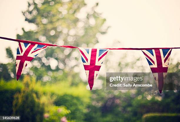 union jack flag bunting - union jack stock pictures, royalty-free photos & images